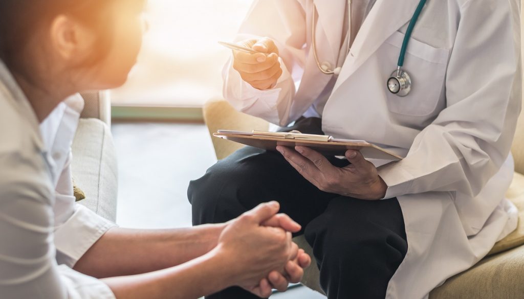 Patient With Doctor Or Psychiatrist Consulting And Diagnos (Bigstock)