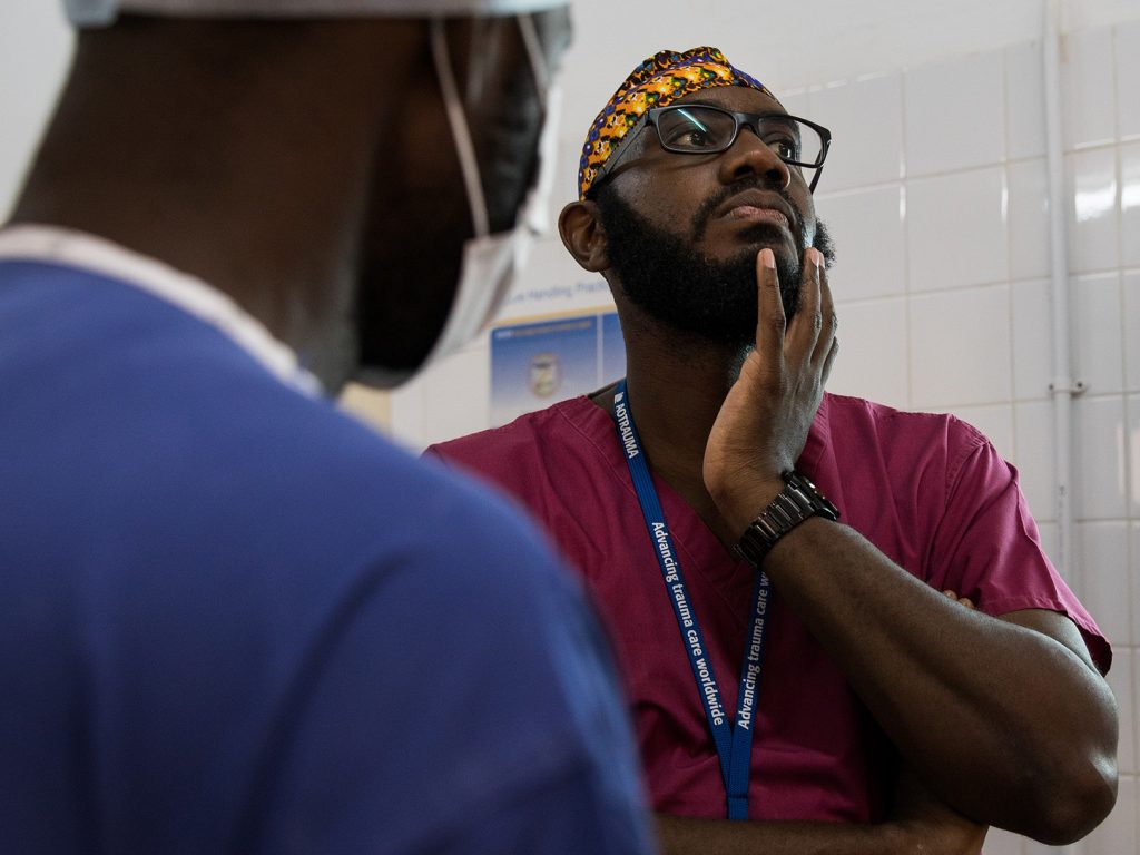 Orthopedic surgeon Kebba Marenah and his team get ready to perform knee surgery on a 14-year-old at the Edward Francis Small Teaching Hospital in Banjul, the capital of Gambia. The country struggles with a lack of access to sufficient pain medications. Orthopedic surgeon Kebba Marenah and his team get ready to perform knee surgery on a 14-year-old at the Edward Francis Small Teaching Hospital in Banjul, the capital of Gambia. The country struggles with a lack of access to sufficient pain medications. (Samantha Reinders for NPR)