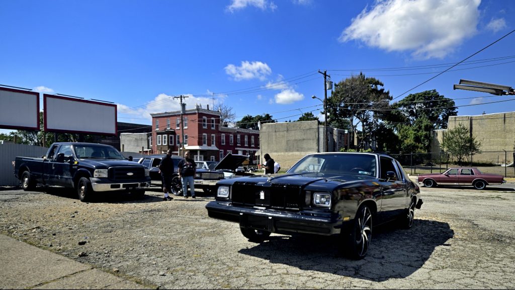 The local classic and American muscle car community gathers for a meet on a North Philadelphia, on Sunday. (Bastiaan Slabbers for Billy Penn)