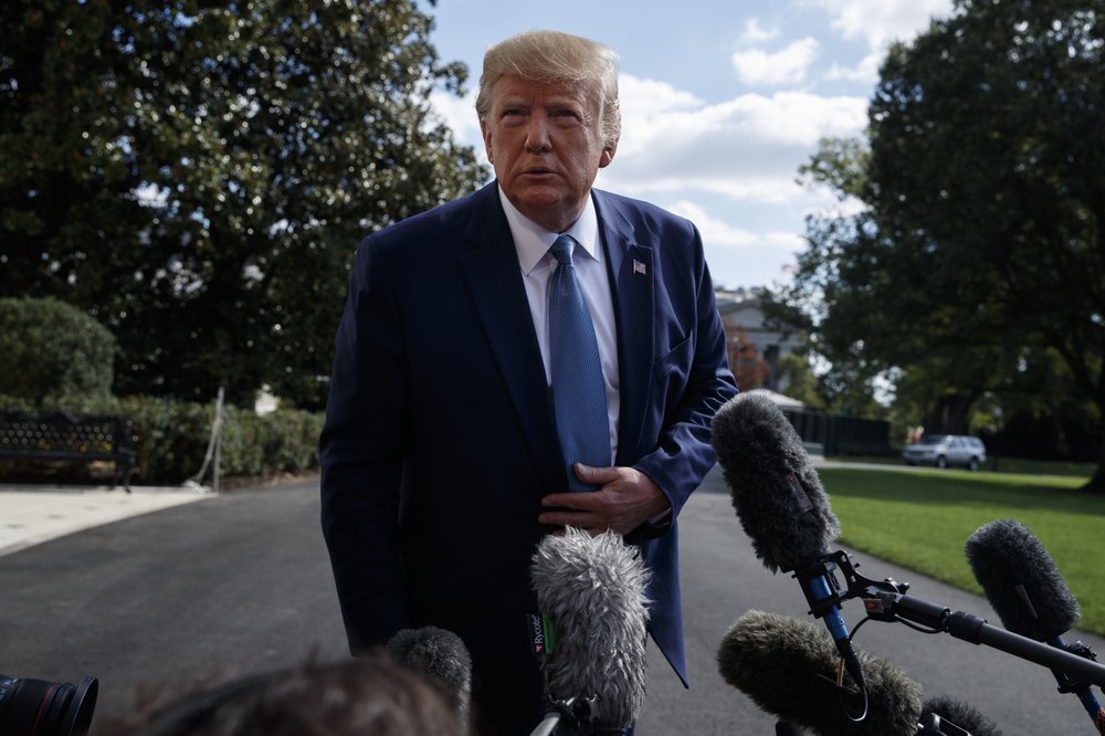 1000 (13) President Donald Trump talks to reporters on the South Lawn of the White House, Friday, Oct. 4, 2019, in Washington. (Evan Vucci/ AP Photo)
