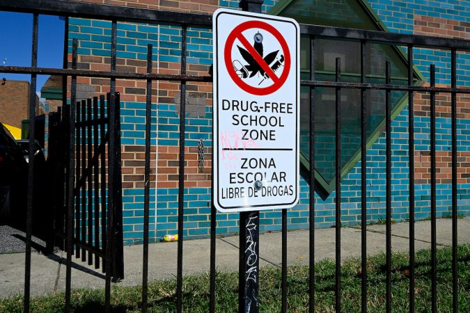 Four-foot-tall fencing surrounds parts of the campus of Lewis Elkin Elementary School. (Bastiaan Slabbers for WHYY)