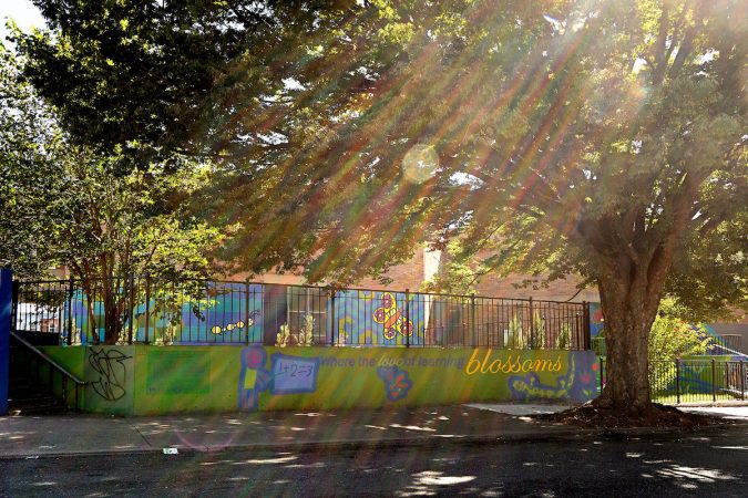 Four-foot-high fences surround parts of Lewis Elkin Elementary School in Kensington. (Bastiaan Slabbers for WHYY)