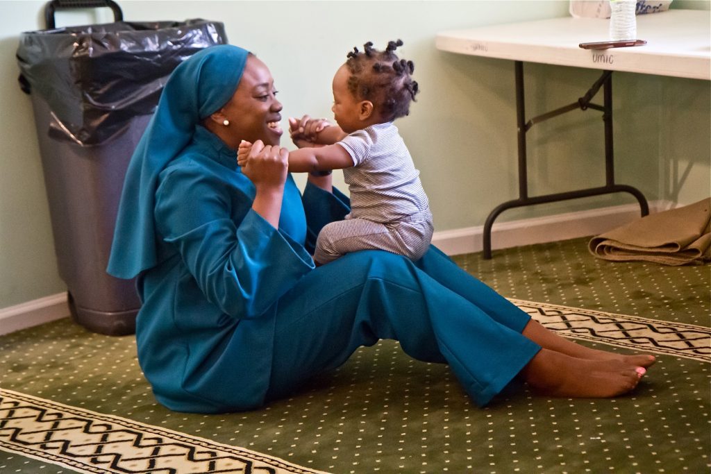 2019 10 18 k paynter sicle cell-5 Tahirah Austin, who has sickle-cell disease, plays with Kinza, the son of a friend who also has the disease. (Kimberly Paynter/WHYY)
