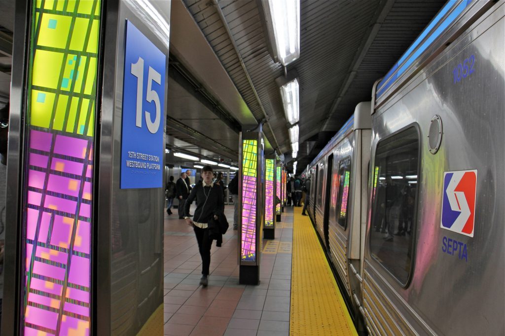2019 10 21-e lee-philadelphia 15th street station-reconstruction Ray King's artwork illuminates the platform of the revamped 15th Street Station. (Emma Lee/WHYY)