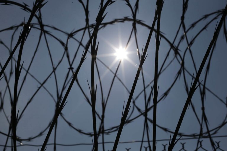 Prison union leaders have long expressed concern about the commonwealth's rising parolee population and shrinking inmate one. (Gerald Herbert/AP Photo)