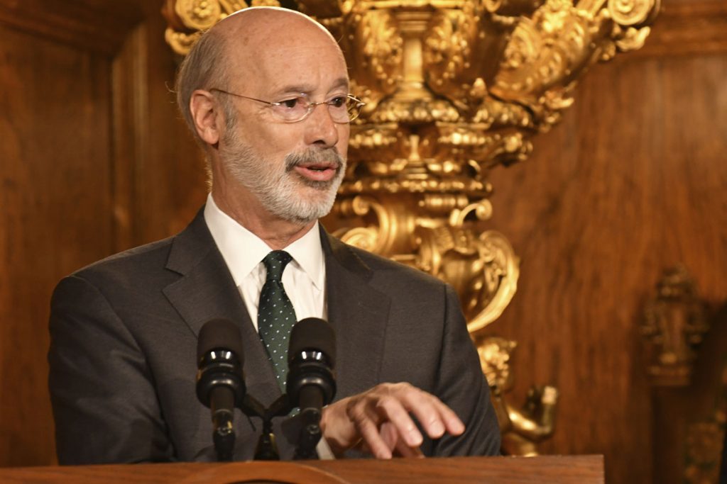 Climate Change-Pennsylvania Pennsylvania Gov. Tom Wolf speaks to reporters during a news conference on his signing an executive order for his administration to start working on regulations to bring Pennsylvania into a nine-state consortium that sets a price and limits on greenhouse gas emissions from power plants, Thursday, Oct. 3, 2019 in Harrisburg, Pa. (Marc Levy/AP Photo)