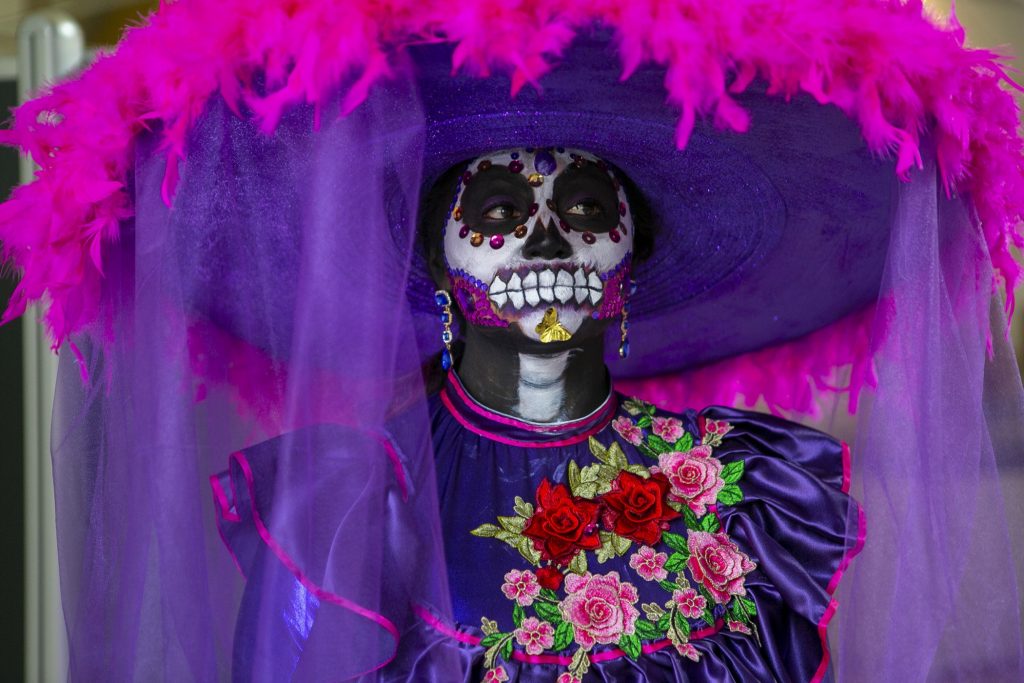 Day of the Dead Rosa E. Ruiz wears an elaborate costume during a celebration of the Mexican tradition, Day of the Dead, at the Penn Museum in Philadelphia. (Miguel Martinez for WHYY)