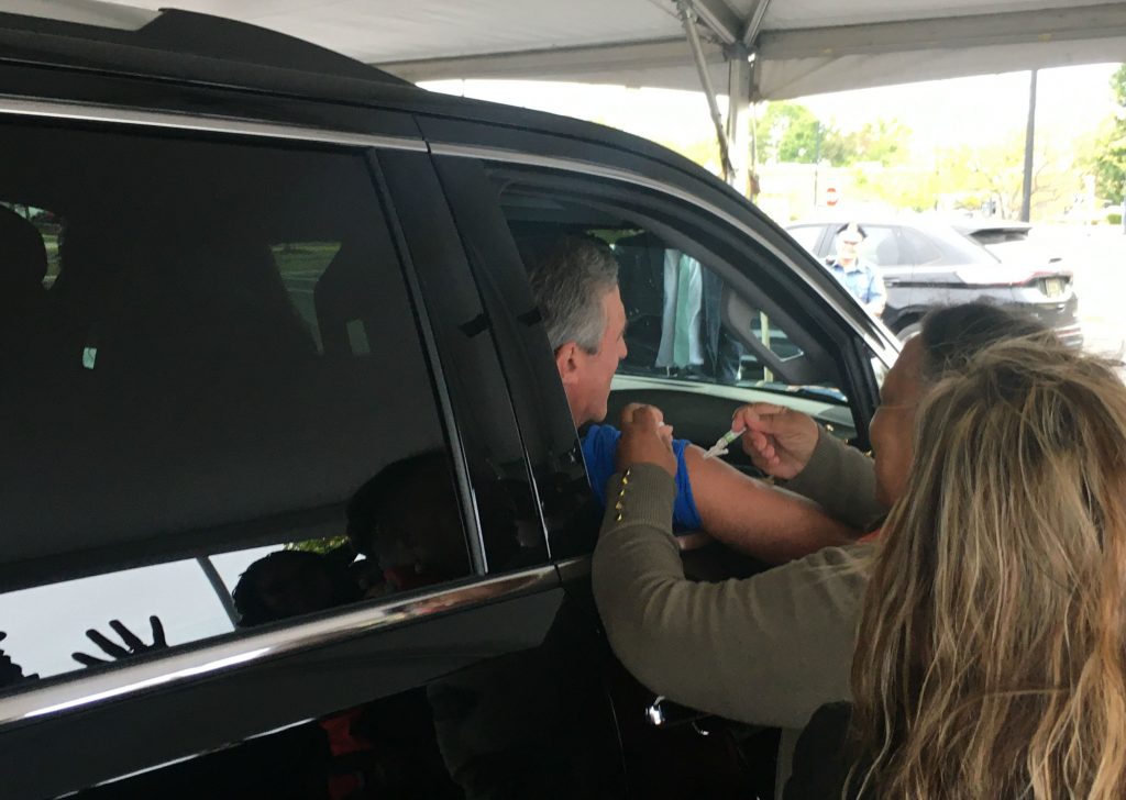 Flu 1 Hundreds of people, including Delaware Gov. John Carney, got their flu vaccine during a drive-thru clinic in Dover on Tuesday. (Mark Eichmann/WHYY)