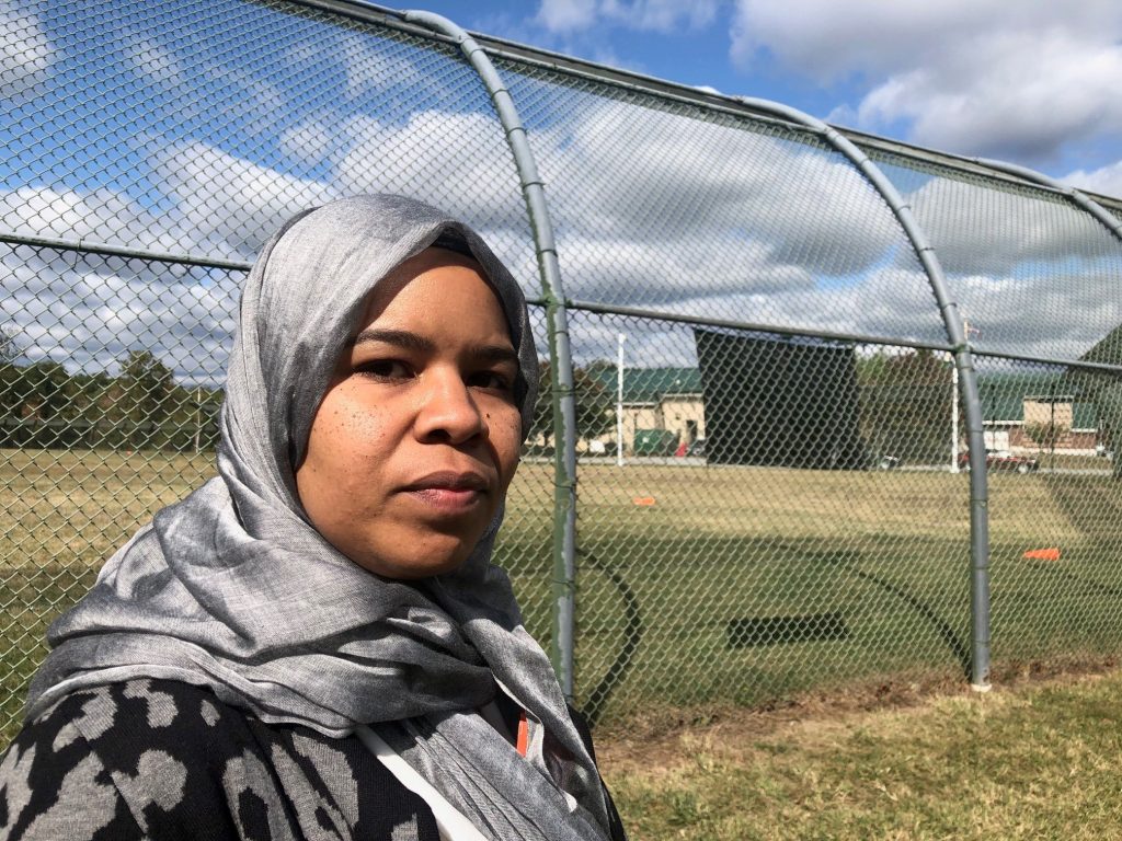 Madinah Brown Madinah Brown has filed federal and state discrimination complaints for the right to wear her hijab to work. The detention center policy says attire should not “pose unnecessary safety risks.” (Cris Barrish/WHYY)