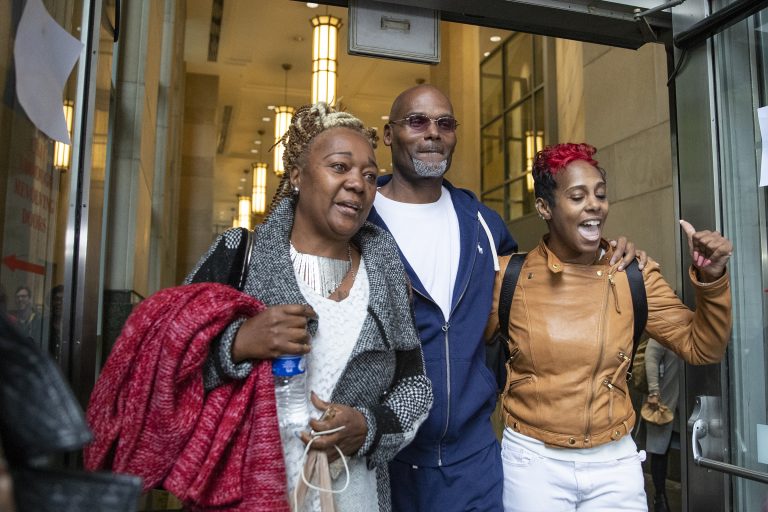 Willie Veasy (center) walks out of the Center for Criminal Justice as a free man after being in prison for 27 years along with his sister, Ketra Veasy (right), and Debra Chappell  on Wednesday, Oct. 09, 2019. (Heather Khalifa/The Philadelphia Inquirer)