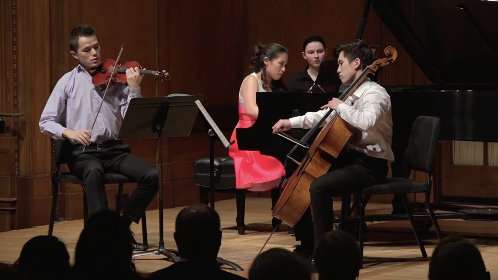 Lun Li, violin; Chase Park, cello; Janice Carissa, piano on stage at Curtis