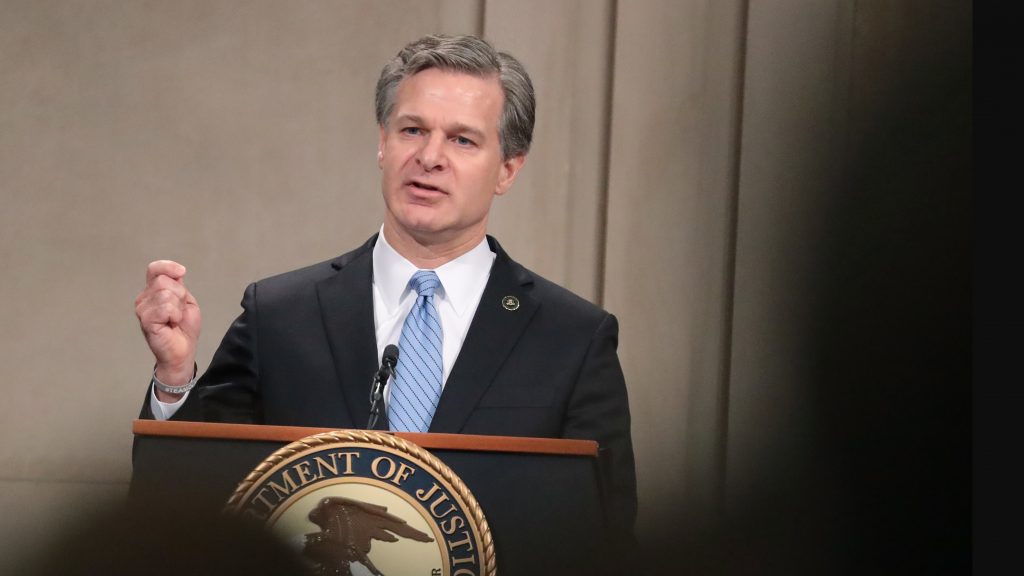 FBI Director Christopher Wray speaks Friday at the Justice Department in Washington, D.C., during a summit on warrant-proof encryption and its impact on child exploitation cases. FBI Director Christopher Wray speaks Friday at the Justice Department in Washington, D.C., during a summit on warrant-proof encryption and its impact on child exploitation cases. (Mark Wilson/Getty Images)