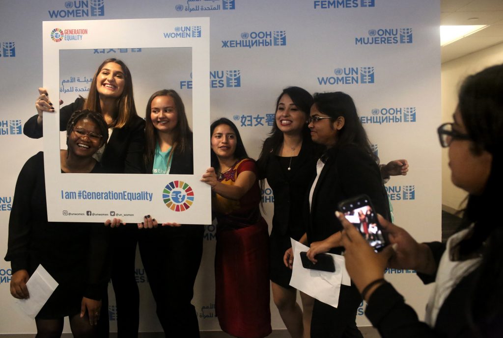 A lighter moment on a serious day: the presentation of a Global Girls’ Bill of Rights at the U.N. Left to right: Six of the young women who helped draft the document: Faith Nwando, 17; Djellza Pulatani, 17; Olivia Lombardo, 16; Angelica Morales, 21; Kanchan Amatya, 22; and Vishakha Agrawal, 20. A lighter moment on a serious day: the presentation of a Global Girls' Bill of Rights at the U.N. Left to right: Six of the young women who helped draft the document: Faith Nwando, 17; Djellza Pulatani, 17; Olivia Lombardo, 16; Angelica Morales, 21; Kanchan Amatya, 22; and Vishakha Agrawal, 20. (Yana Paskova for NPR)