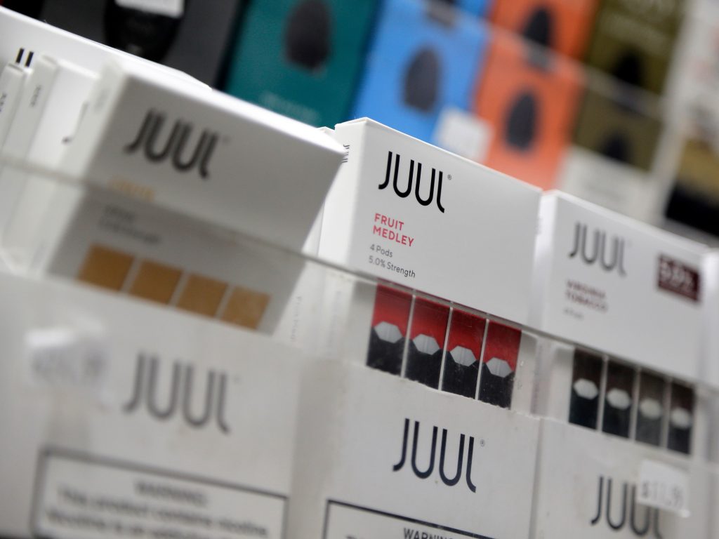 Juul announced it will suspend sales of all non-tobacco, non menthol-based flavors of its e-cigarette products. Juul announced it will suspend sales of all non-tobacco, non menthol-based flavors of its e-cigarette products. (Seth Wenig/AP Photo)