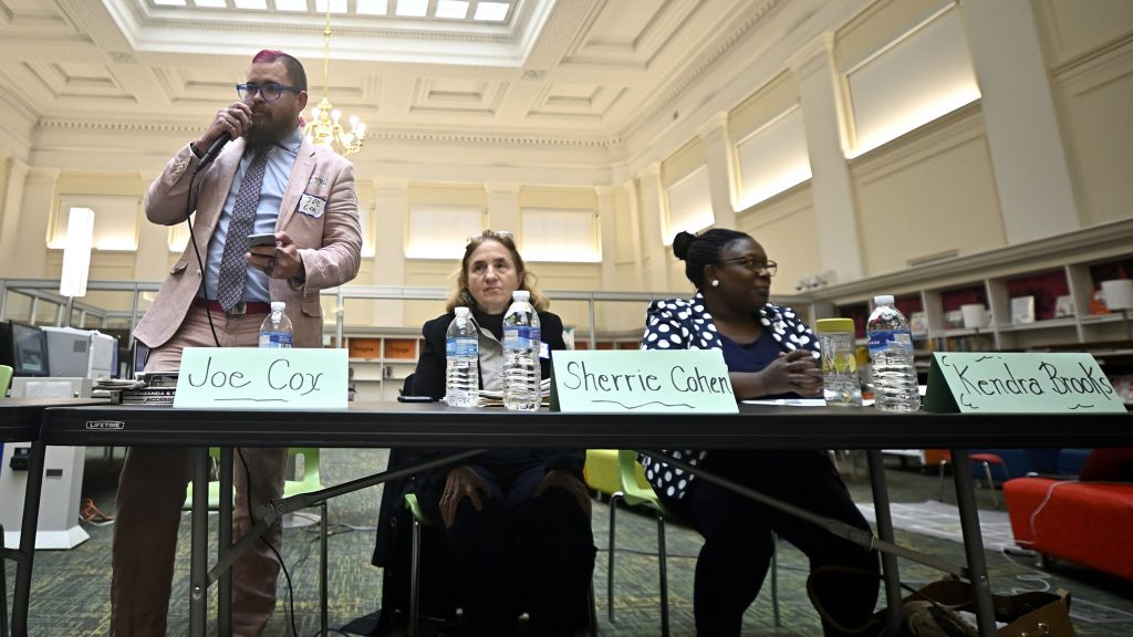 20191021 – Candidate Forum – BS1666 Independent Joe Cox speaks before departing early at the city council candidate forum for the at-large seat, held at the Lillian Marrero Library on Monday.