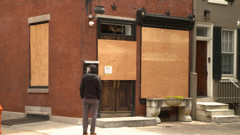 A restaurant in Philadelphia boarded up due to the coronavirus pandemic