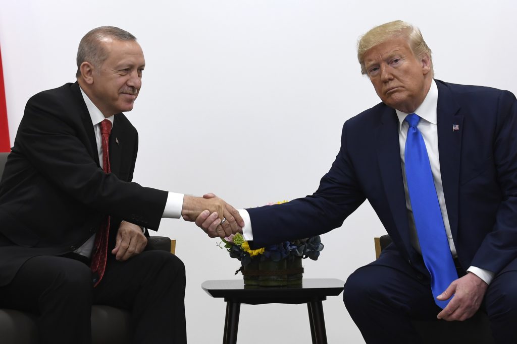 Donald Trump, Recep Tayyip Erdogan President Donald Trump, right, shakes hands with Turkish President Recep Tayyip Erdogan, left, during a meeting on the sidelines of the G-20 summit in Osaka, Japan, Saturday, June 29, 2019. (AP Photo/Susan Walsh)