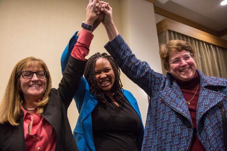 Democrats (from left) Elaine Paul Schaefer, Monica Taylor, and Christine Reuther celebrate their sweep of the three open seats on the Delaware County Council. (Emily Cohen for WHYY)