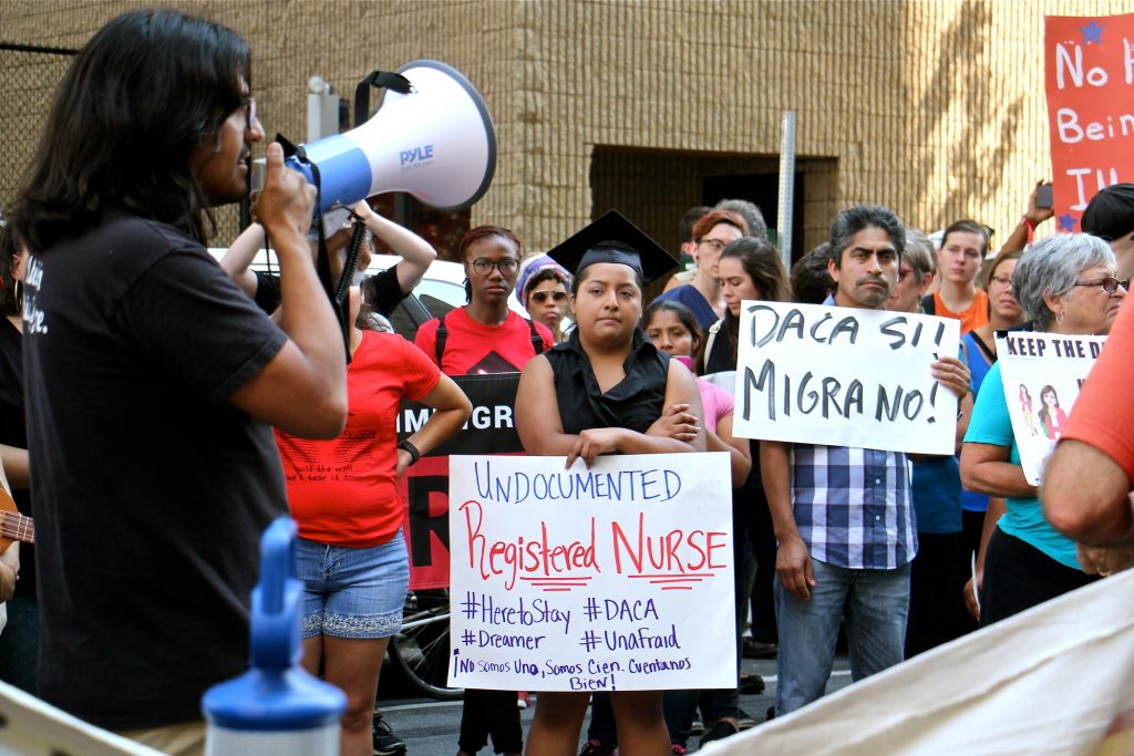 2017 09 05-e lee-anel medina-philadelphia-daca registered nurse undocumented dreamer Anel Medina (center), a registered nurse who graduated from Delaware County Community College, joins a rally in support of DACA. (Emma Lee/WHYY)
