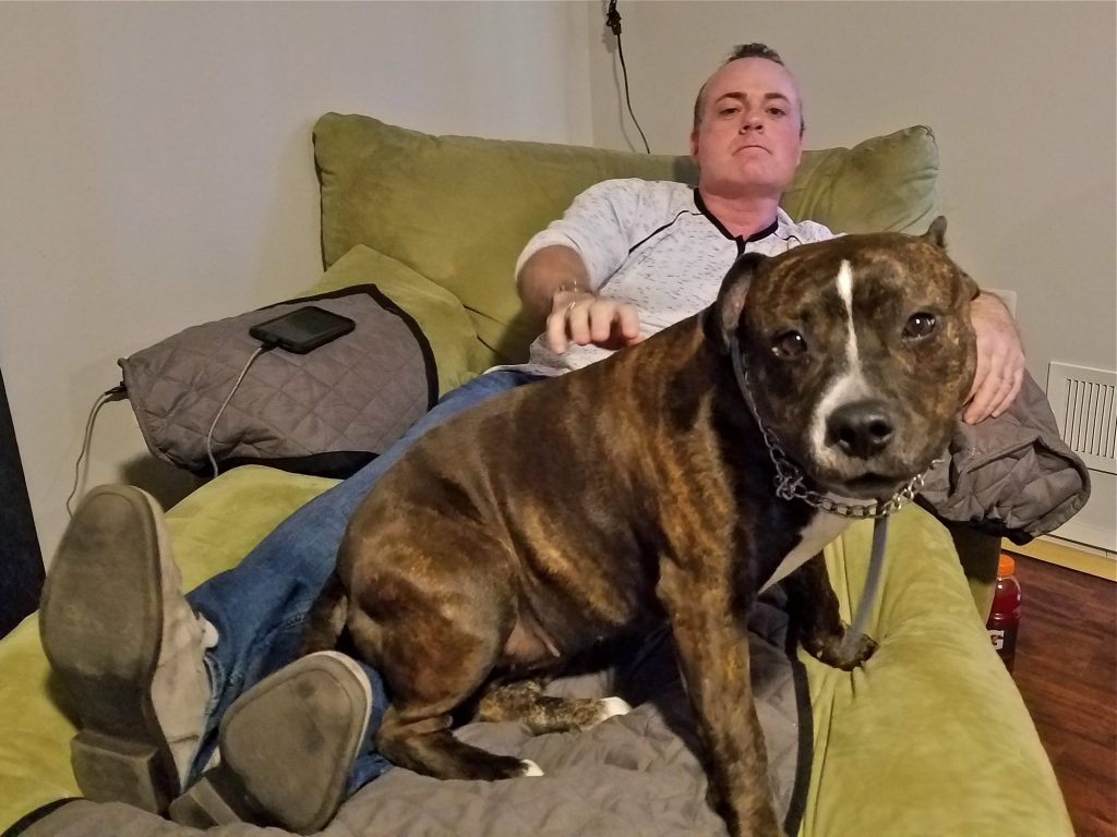 2019 11 20-n pugliese-patrick hennessy-bayville nj-statute of limitations Patrick Hennessy with his pitbull Roxy at his home in Bayville, N.J. (Nicholas Pugliese/WHYY)