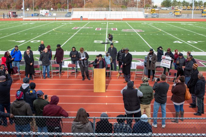 Lonniyell “The Community” Sykes addresses the crowd. (Becca Haydu for WHYY)