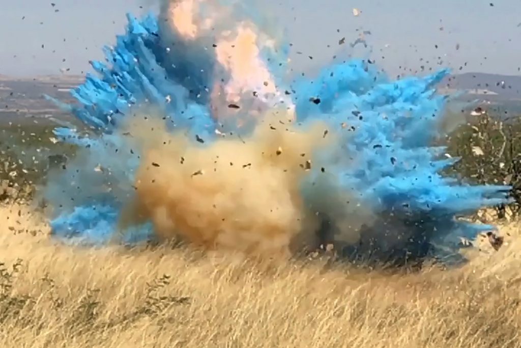 Gender Reveal Explosions In this frame grab from a April 23, 2017, video provided by the U.S. Forest Service, is a gender reveal event in the Santa Rita Mountain's foothills, more than 40 miles southeast of Tucson, Ariz. The explosion from the reveal ignited the 47,000-acre Sawmill Fire. (U.S. Forest Service via AP Photos)