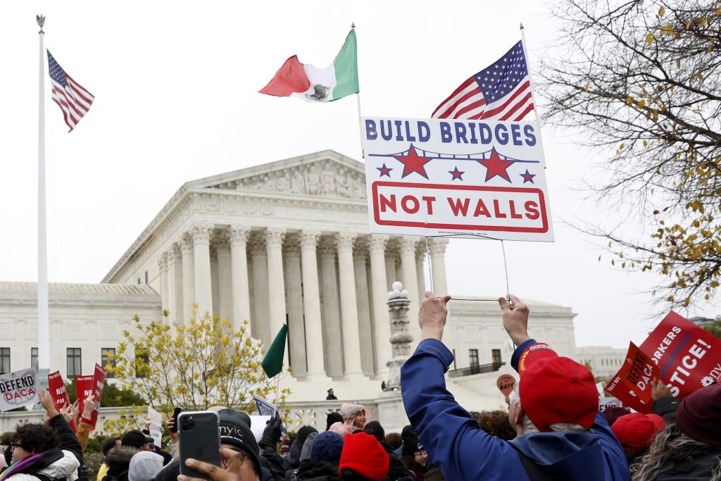 Martin Batalia Vidal People rally outside the Supreme Court as oral arguments are heard in the case of President Trump's decision to end the Obama-era, Deferred Action for Childhood Arrivals program (DACA), Tuesday, Nov. 12, 2019, at the Supreme Court in Washington. (Jacquelyn Martin/AP Photo)
