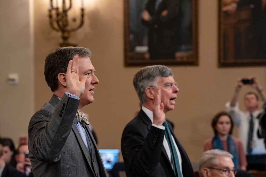AP_19317567291010-rs Career Foreign Service officer George Kent, left, and top U.S. diplomat in Ukraine William Taylor, right, are sworn in to testify before the House Intelligence Committee on Capitol Hill in Washington, Wednesday, Nov. 13, 2019, during the first public impeachment hearings on President Donald Trump's efforts to tie U.S. aid for Ukraine to investigations of his political opponents. (AP Photo/(AP Photo/J. Scott Applewhite)