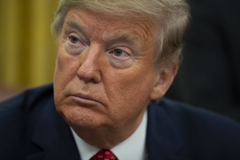 President Donald Trump listens during an event to sign an executive order establishing the Task Force on Missing and Murdered American Indians and Alaska Natives, in the Oval Office of the White House, Tuesday, Nov. 26, 2019, in Washington. (Evan Vucci/AP Photo)