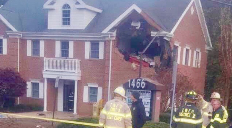 IMG-3755 Police say a luxury sports car crashed into the second floor of a Jersey Shore professional office building, killing two people. (Courtesy of Kiefer Armbrecht via Jersey Shore Hurricane News/Facebook).