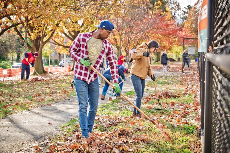 Volunteers raking leaves at Cobbs Creek Park during 2018's Love Your Park Fall Service Day. (Courtesy of Steve Belkowitz)