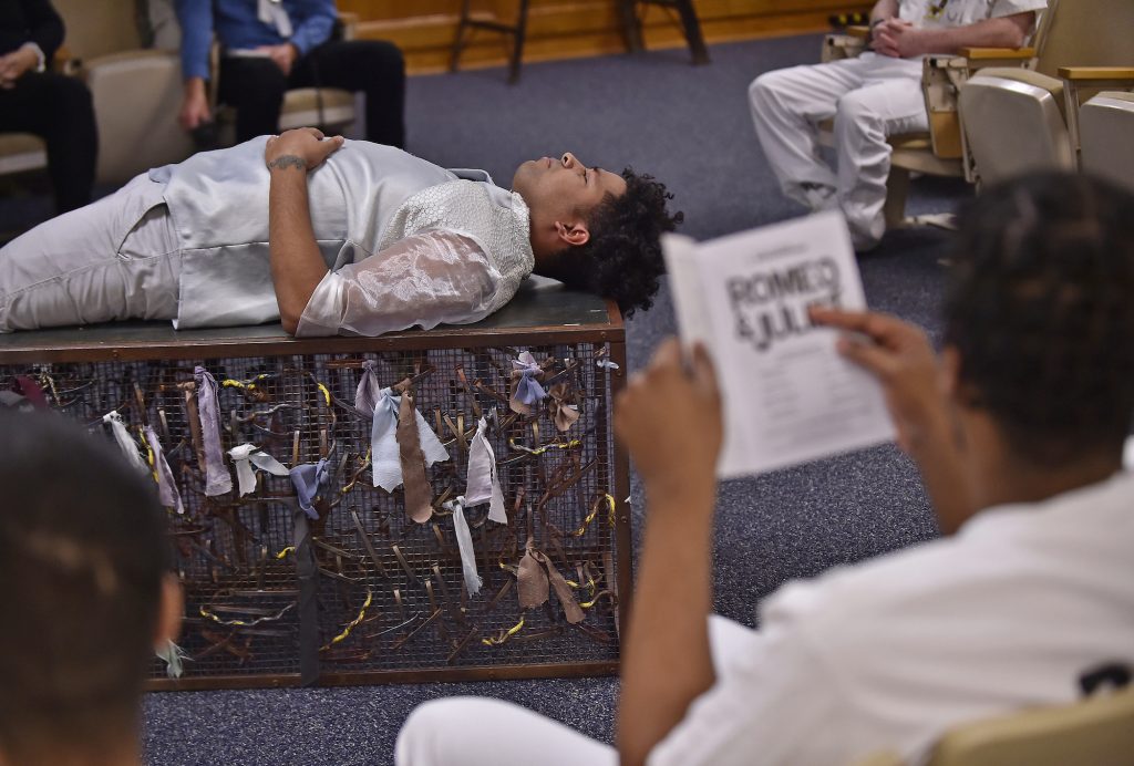 ShakespearePlayAtPrison11 Delaware Shakespeare actor Wilfredo Amill plays the part of Romeo during a performance of Romeo & Juliet held at the Howard R. Young Correctional Institution in Wilmington on Tuesday, November 12, 2019. (Butch Comegys for WHYY)