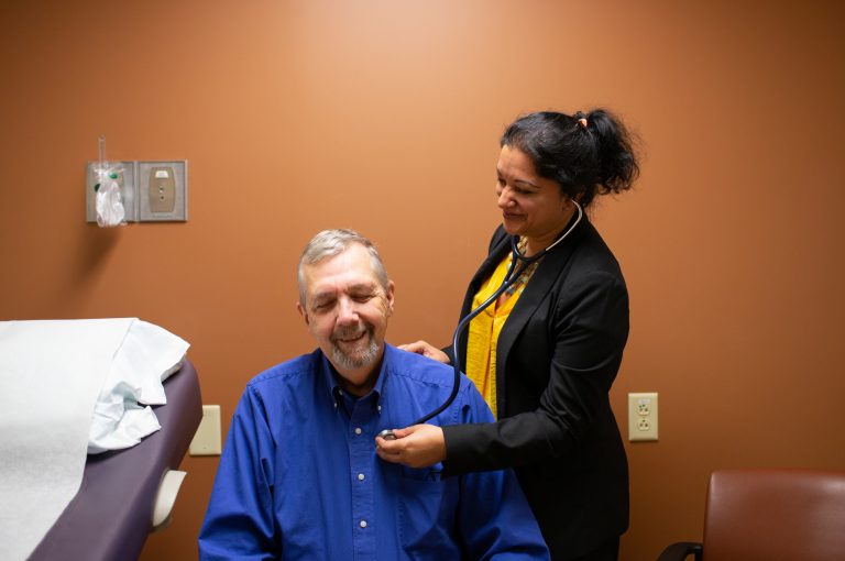 Geriatric oncologist Supriya Gupta Mohile meets with patient Jim Mulcahy at Highland Hospital in Rochester, N.Y. 