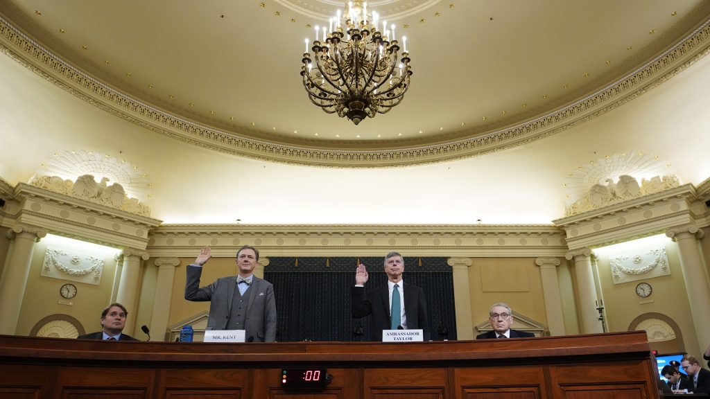 Deputy Assistant Secretary for European and Eurasian Affairs George Kent and top U.S. diplomat in Ukraine William Taylor are sworn in prior to testifying before the House Intelligence Committee on Wednesday. Deputy Assistant Secretary for European and Eurasian Affairs George Kent and top U.S. diplomat in Ukraine William Taylor are sworn in prior to testifying before the House Intelligence Committee on Wednesday. (Pool/Getty Images)