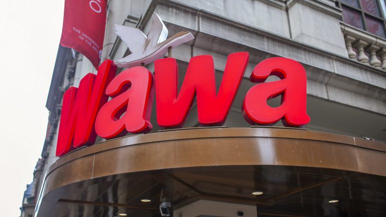 A closeup of a Wawa sign