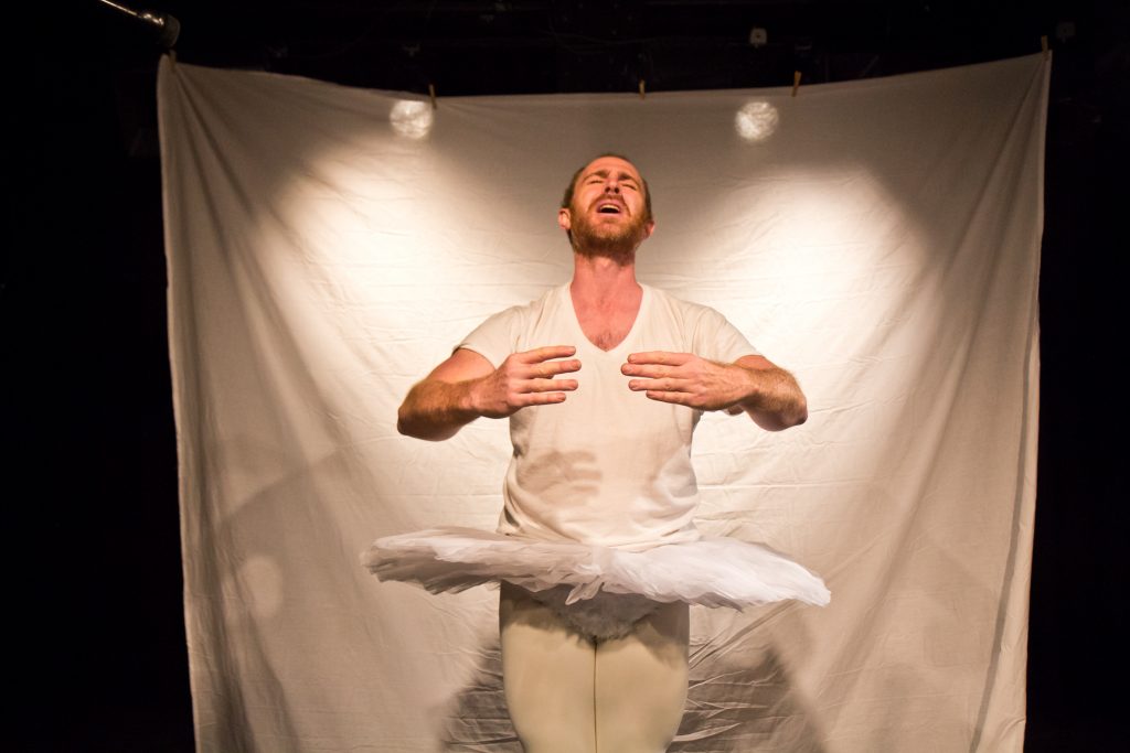 2019 12 12 k paynter one-man nutcracker Chris Davis, writer and star of 'One-Man Nutcracker,' commiserates about ballet classes during rehearsal at Plays and Players theater. (Kimberly Paynter/WHYY)