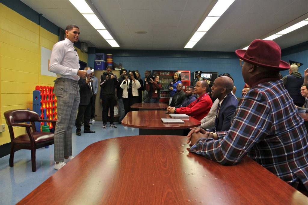 2019 12 16-e lee-tobias harris-philadelphia bethune elementary school Basketball starr Tobias Harris speaks with a group of Black male teachers at Bethune Elementary School. (Emma Lee/WHYY)