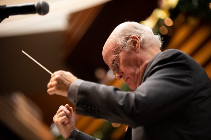 Jay Krush leads the tuba ensemble during the performance. (Kriston Jae Bethel for WHYY)
