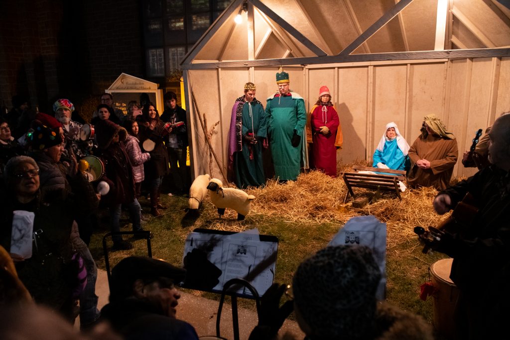 20191221_WHYY_Parranda_247 A parranda sings Christmas carols in front of a live nativity at Conshohocken United Methodist Church in Conshohocken, Pa. (Kriston Jae Bethel for WHYY)