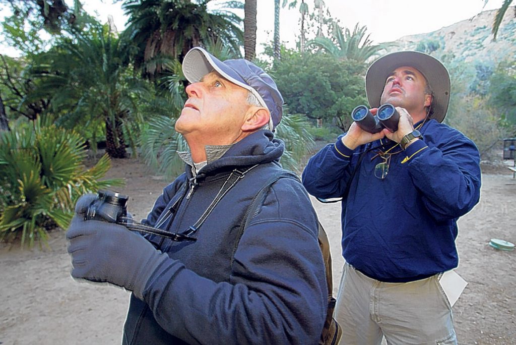 Dale Thayer, Craig Peyton Dale Thayer of British Columbia, Canada, left, and Craig Peyton, of Phoenix, look for birds at the Boyce Thompson Arboretum in Superior, Ariz. in this Jan. 4, 2007. (AP Photo/East Valley Tribune, Toru Kawana)
