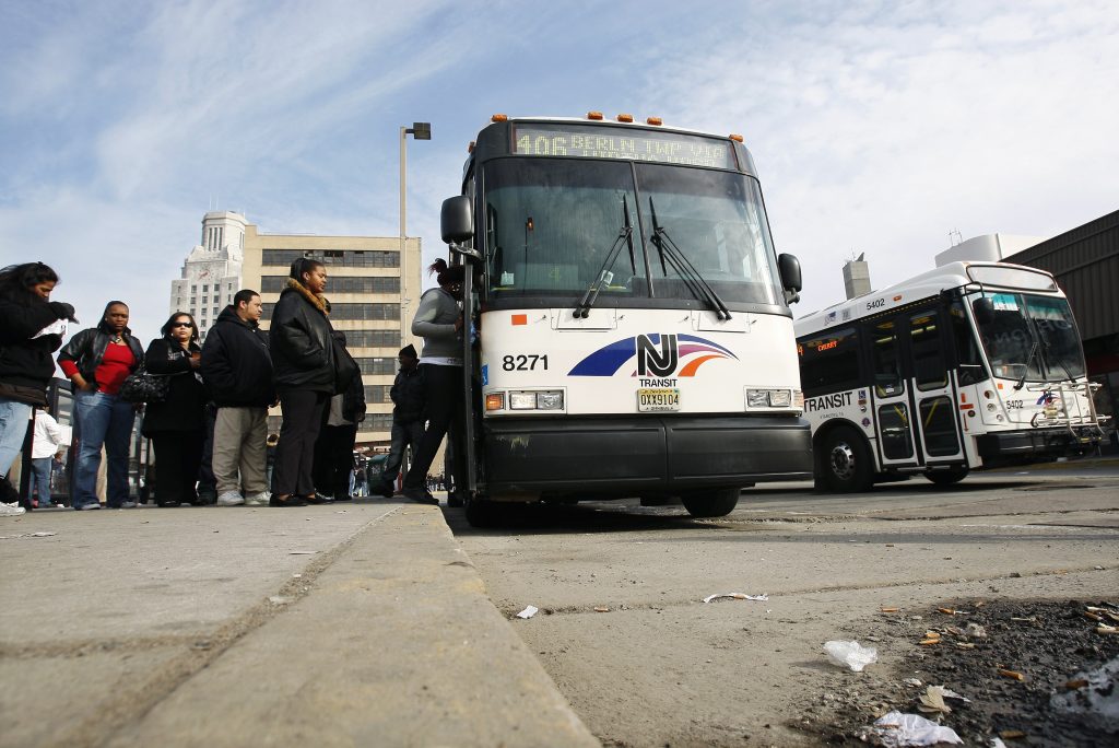 AP_100310053424 Passengers board an NJ Transit bus in Camden, N.J. (Mel Evans/AP Photo)