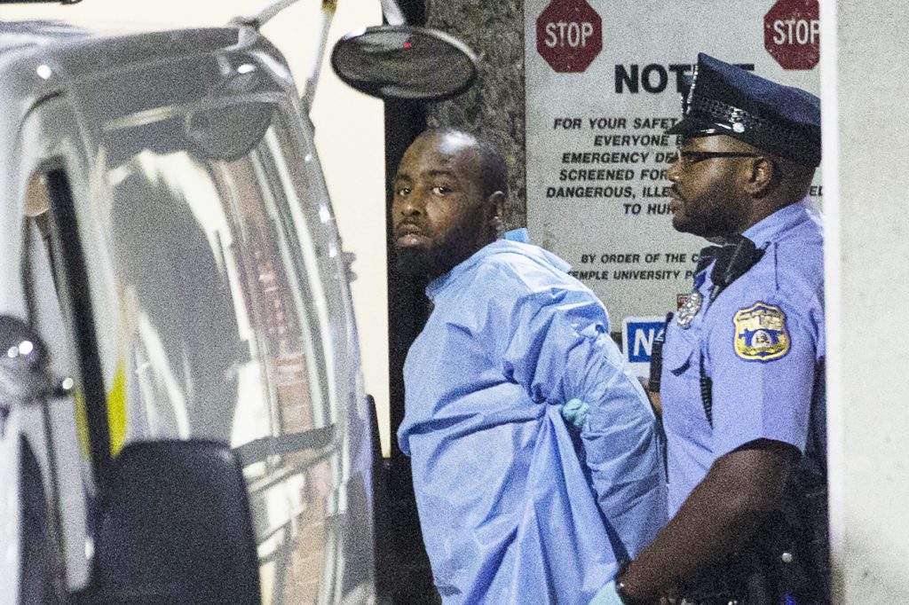 Police take shooting suspect Maurice Hill into custody