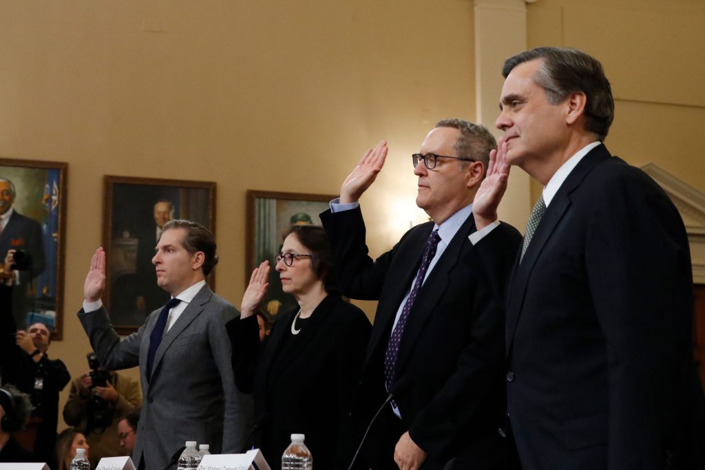 From left, Constitutional law experts, Harvard Law School professor Noah Feldman, Stanford Law School professor Pamela Karlan, University of North Carolina Law School professor Michael Gerhardt and George Washington University Law School professor Jonathan Turley are sworn in before testifying during a hearing before the House Judiciary Committee on the constitutional grounds for the impeachment of President Donald Trump, on Capitol Hill in Washington, Wednesday, Dec. 4, 2019. (AP Photo/Alex Brandon)