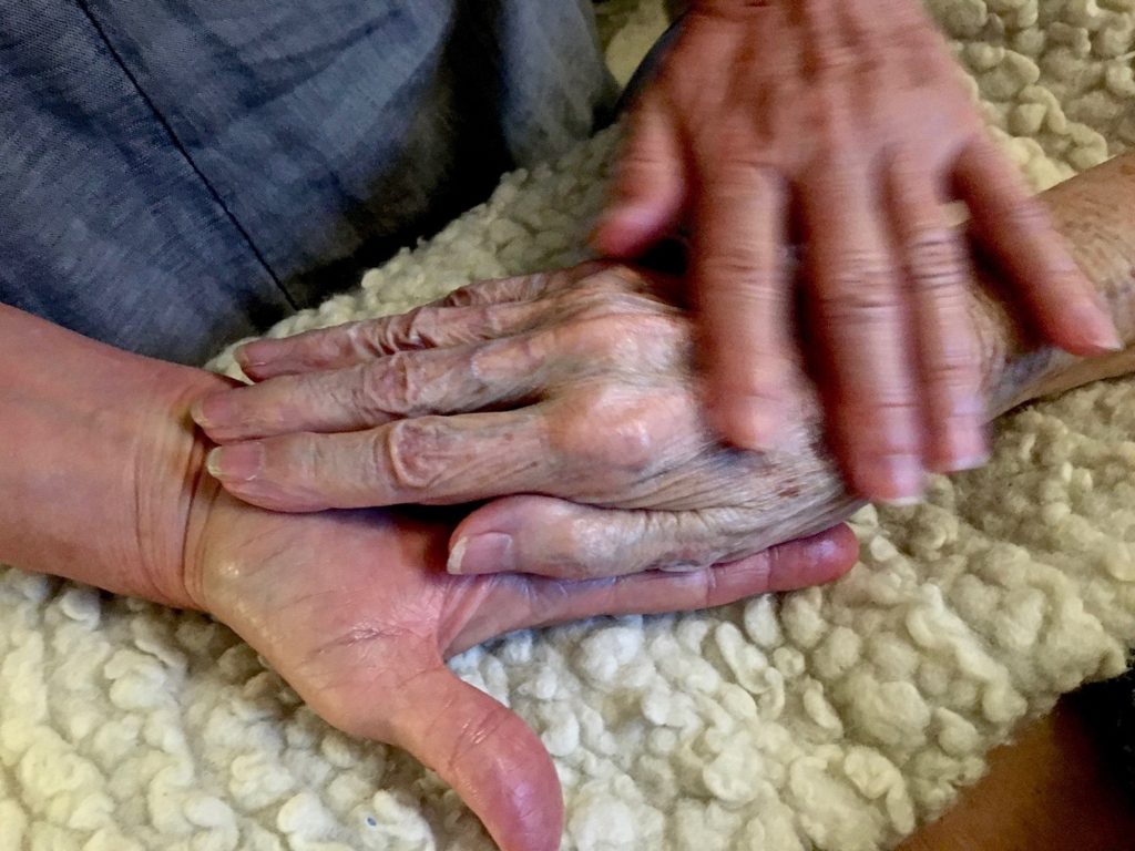 Dying at Home Allison Beach holds the hand of her ailing mother Kathryne Beach inside her home in Hinesburg, Vt. Allison (Thomas Marrinson/AP Photos)