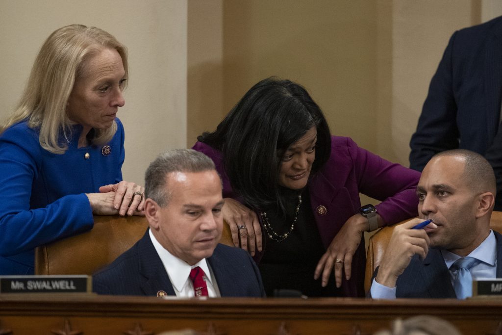 Mary Gay Scanlon, David Cicilline, Pramila Jaypak, Hakeem Jeffries Left to right, Rep. Mary Gay Scanlon, D-PA., Rep. David Cicilline, D-R.I., Rep. Pramila Jayapal, D-Wash., and Rep. Hakeem Jeffries, D-N.Y., confer during a House Judiciary Committee markup of Articles of Impeachment against President Donald Trump, Thursday Dec. 12, 2019 on Capitol Hill in Washington. (Alex Edelman/Pool via AP)