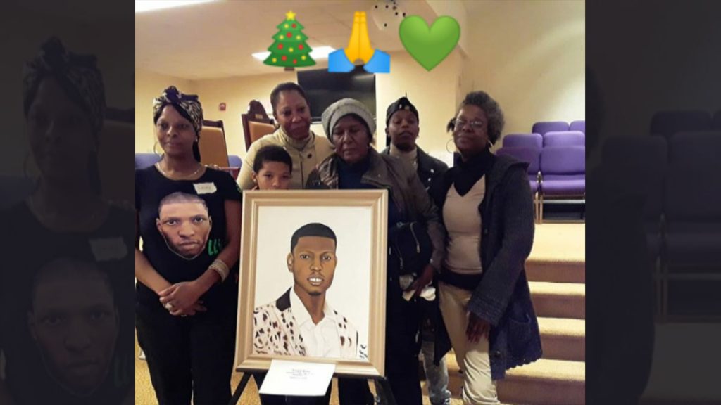 Attach56322_20191222_150637 Members of Virgil's family picking up a donated portrait of him this December. (Courtesy of Sandy Ross)