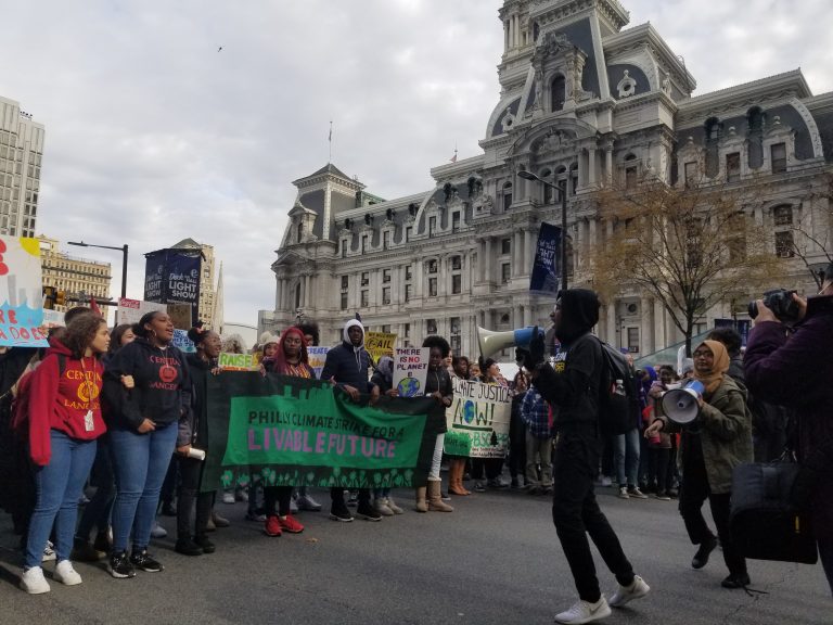 Students protest against fossil fuels during a climate strike on Friday. The school district permitted them to leave school with an excused absence. (Joseph Staruski/The Notebook)