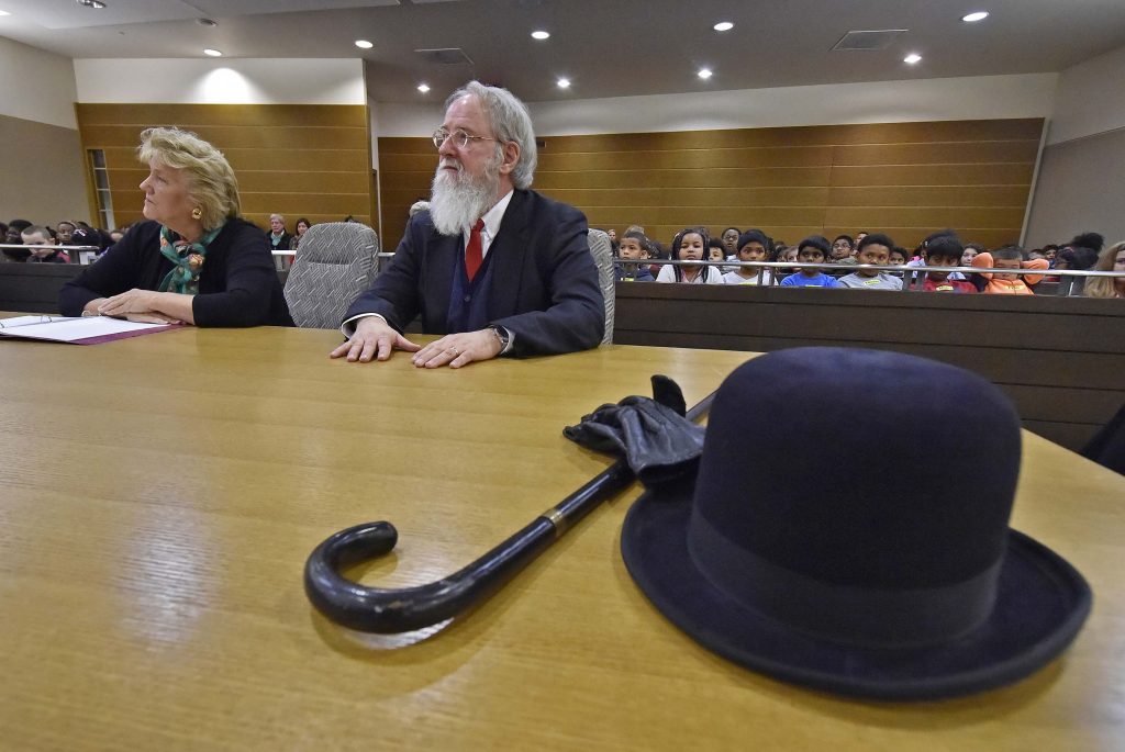 KrisKringlePerformanceInCourt1 The Honorable M. Jane Brady sits next to Kent County, De. Family Court Judge James G. McGiffin, Jr., portraying Kris Kringle take part in a Christmas performance inside a courtroom at the New Castle County Courthouse in downtown Wilmington on Friday, Dec. 13, 2019. (Butch Comegys for WHYY)