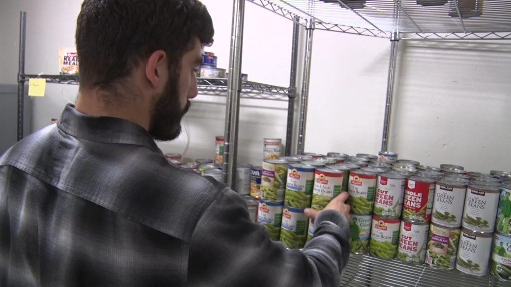 Sean Hardy, a senior at Montclair State University visits the food pantry there. (NJTV News)