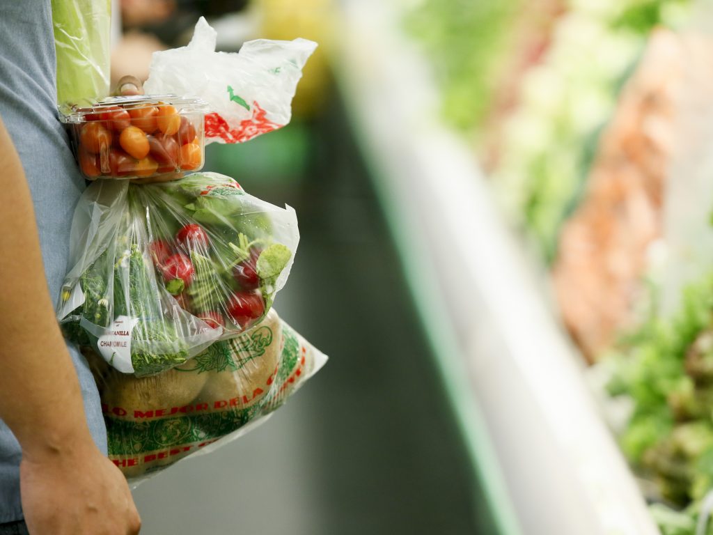 SNAP A man buys groceries in a supermarket.